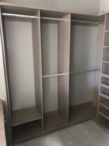 Built-In-Wardrobe-Colour-Board-Shelving-with-Chrome-Hanging-Rods