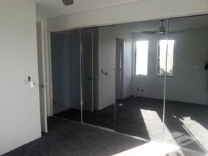 frameless-grey-mirror-robe-doors