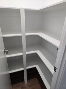CustomStorageWalkInPantryFixedshelvingwhitewardrobes