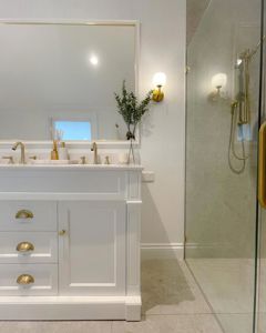 ShowerScreens_10mm_Hinged_GoldHardware__AccessibleEntry_littlehouserenovations